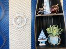 Rustic White Decorative Ship Wheel With Sailboat 12""